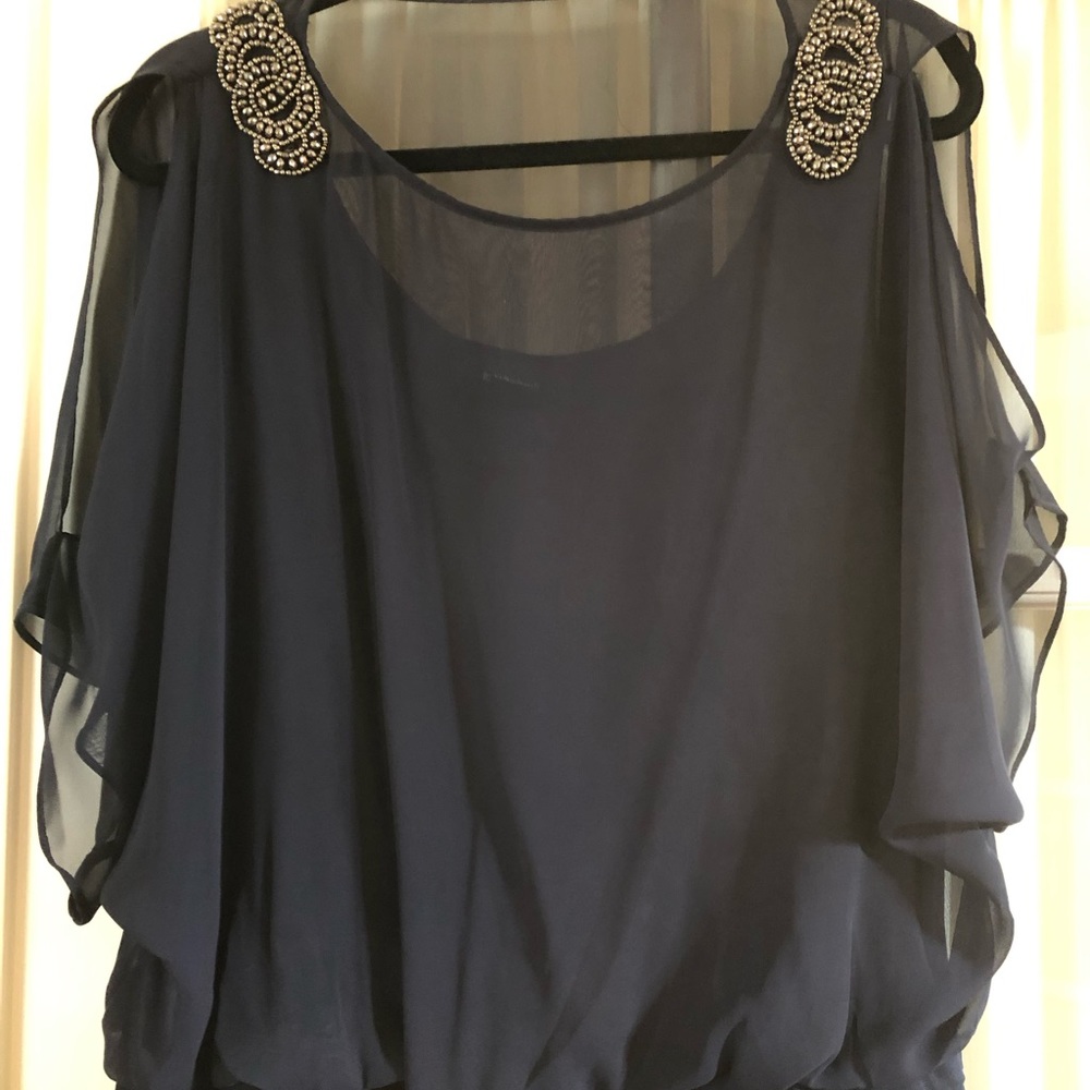 Dressy navy knee length dress.